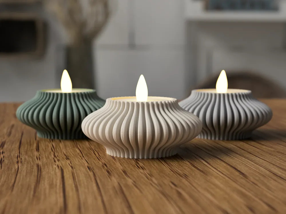 Minimalistiske fyrfadsstager i tre farver